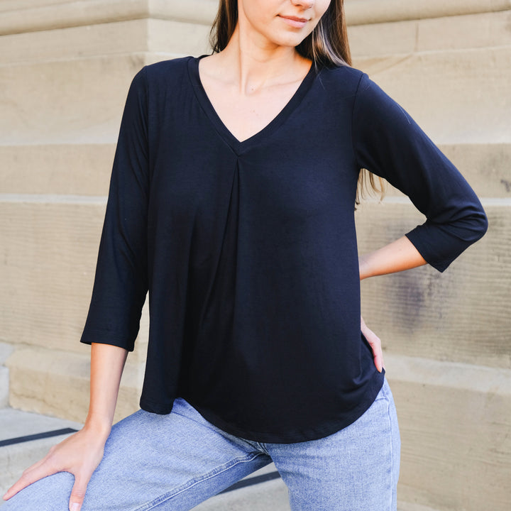 Model wearing Jia+Kate braless bamboo top Eileen style 3/4 sleeve with center inverted pleat design